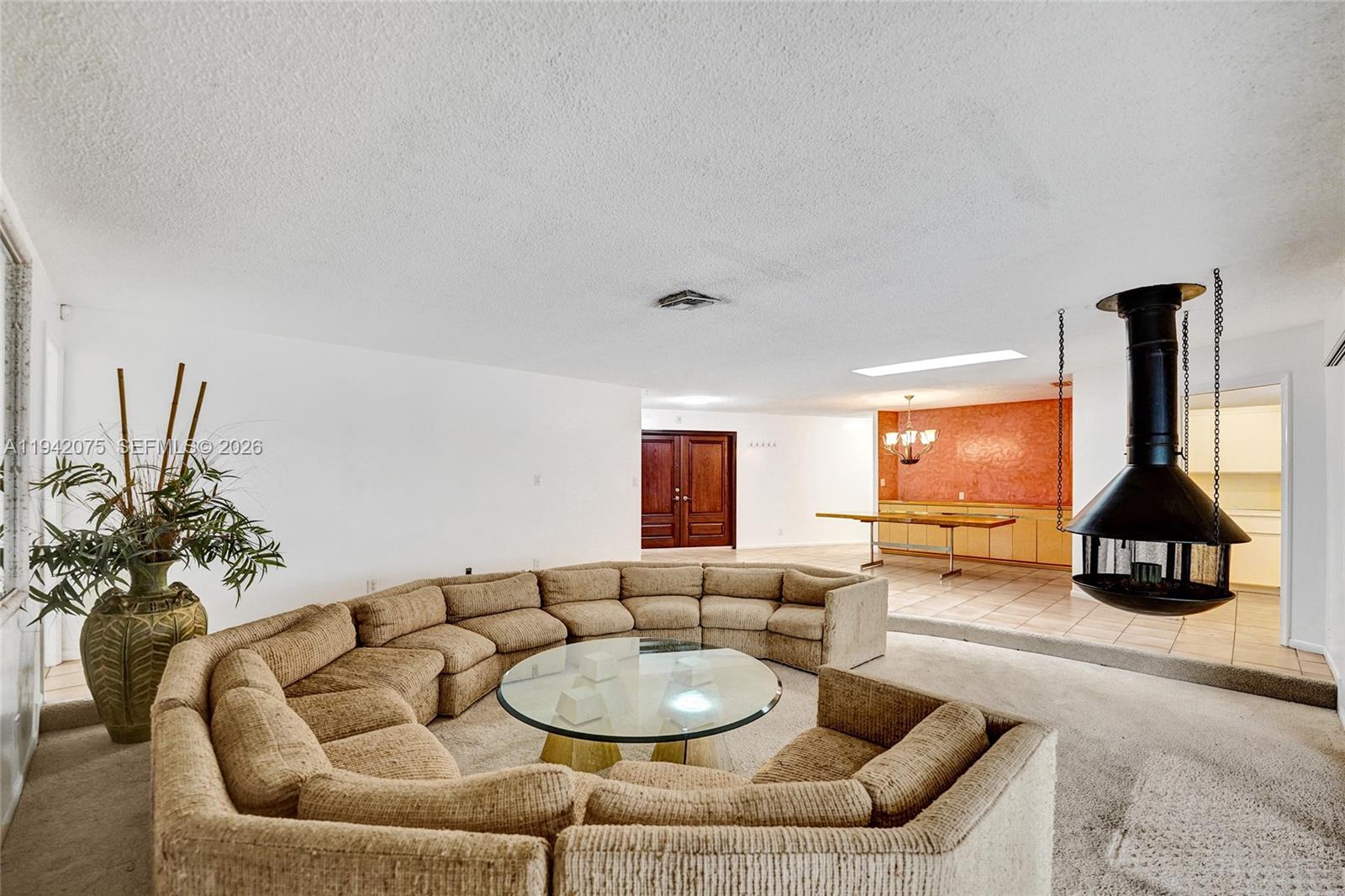 7420 Southwest 13th Street Plantation, FL 33317 - Photo 17 of 68 a living room with furniture and a lamp