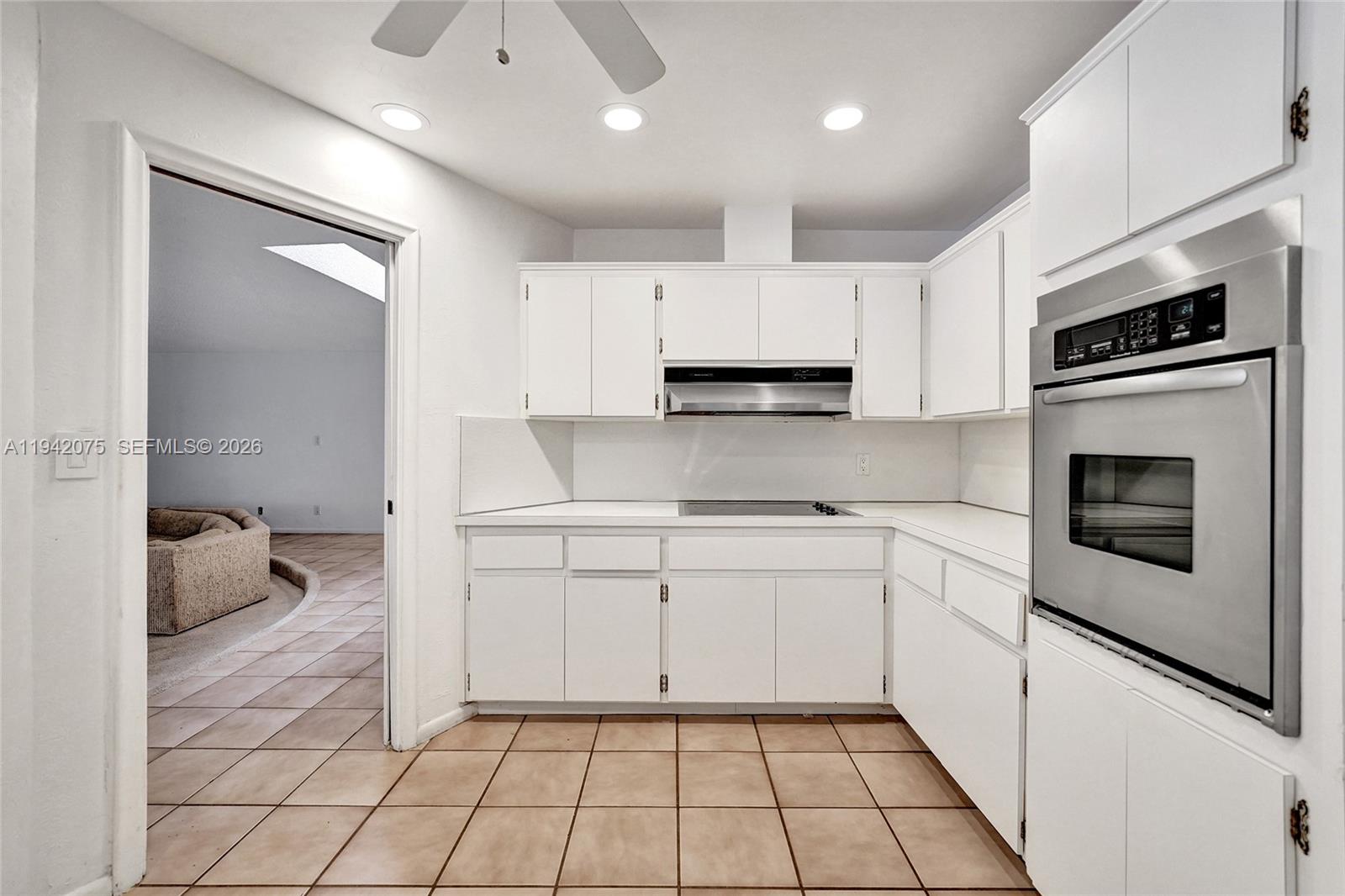 7420 Southwest 13th Street Plantation, FL 33317 - Photo 21 of 68 a kitchen with a sink cabinets and appliances