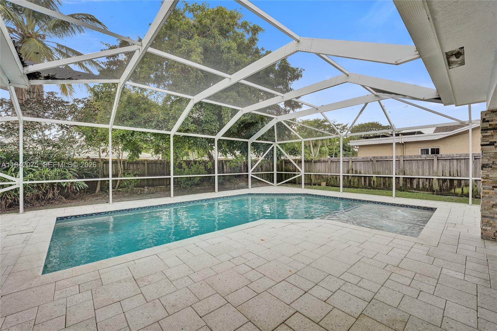 7420 Southwest 13th Street Plantation, FL 33317 - Photo 3 of 68 a view of a backyard
