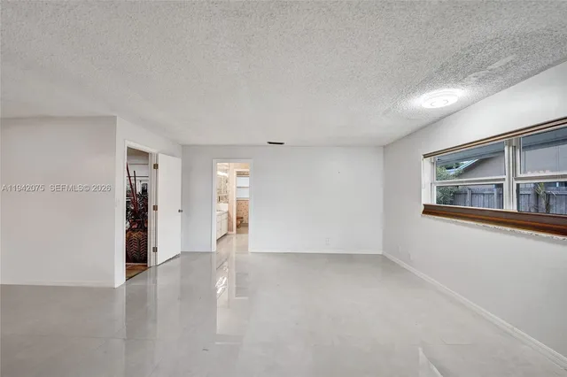 a house view with a backyard space