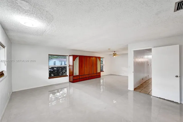 a view of a bench in backyard