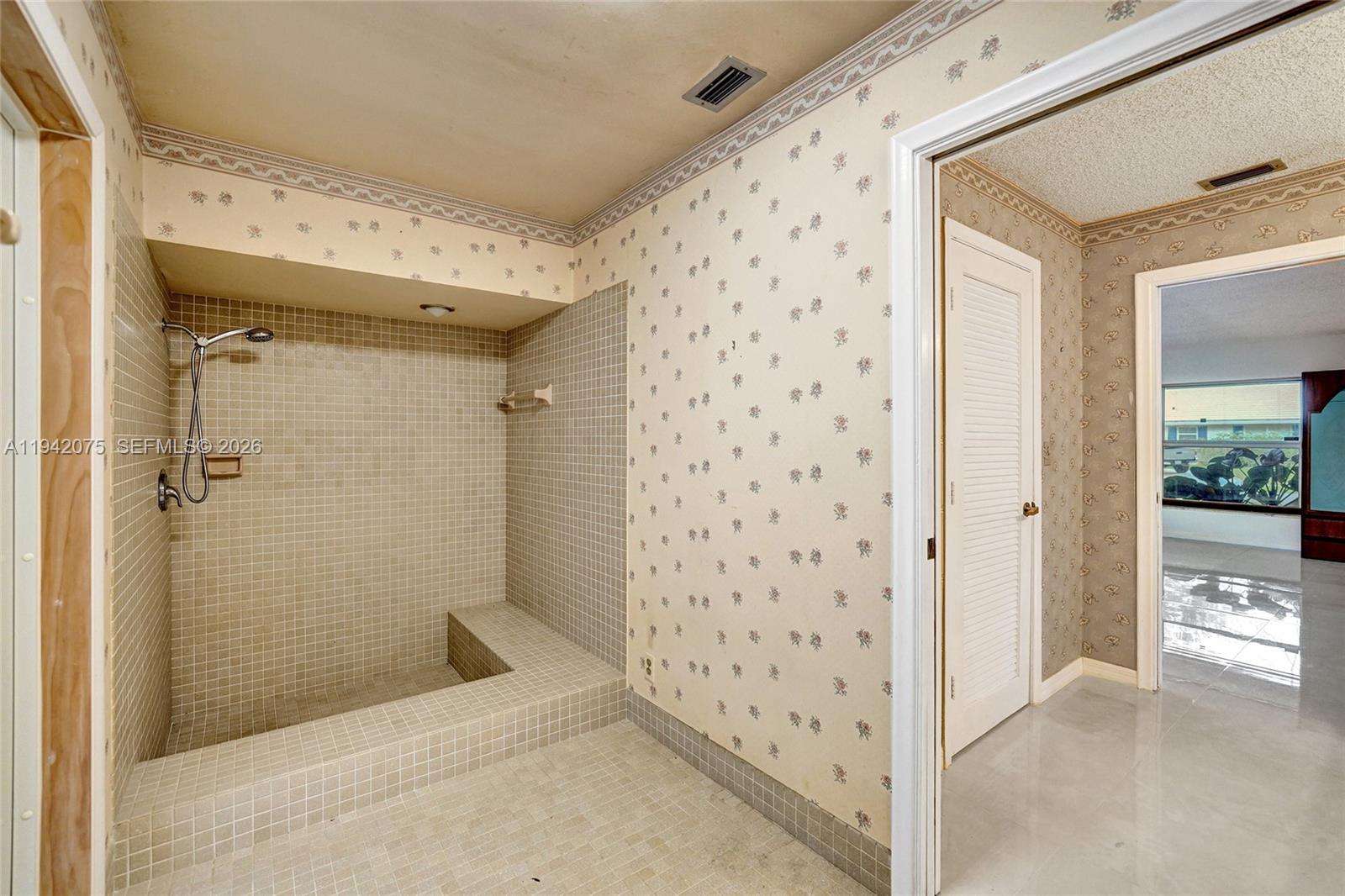 7420 Southwest 13th Street Plantation, FL 33317 - Photo 53 of 68 a bathroom with a shower