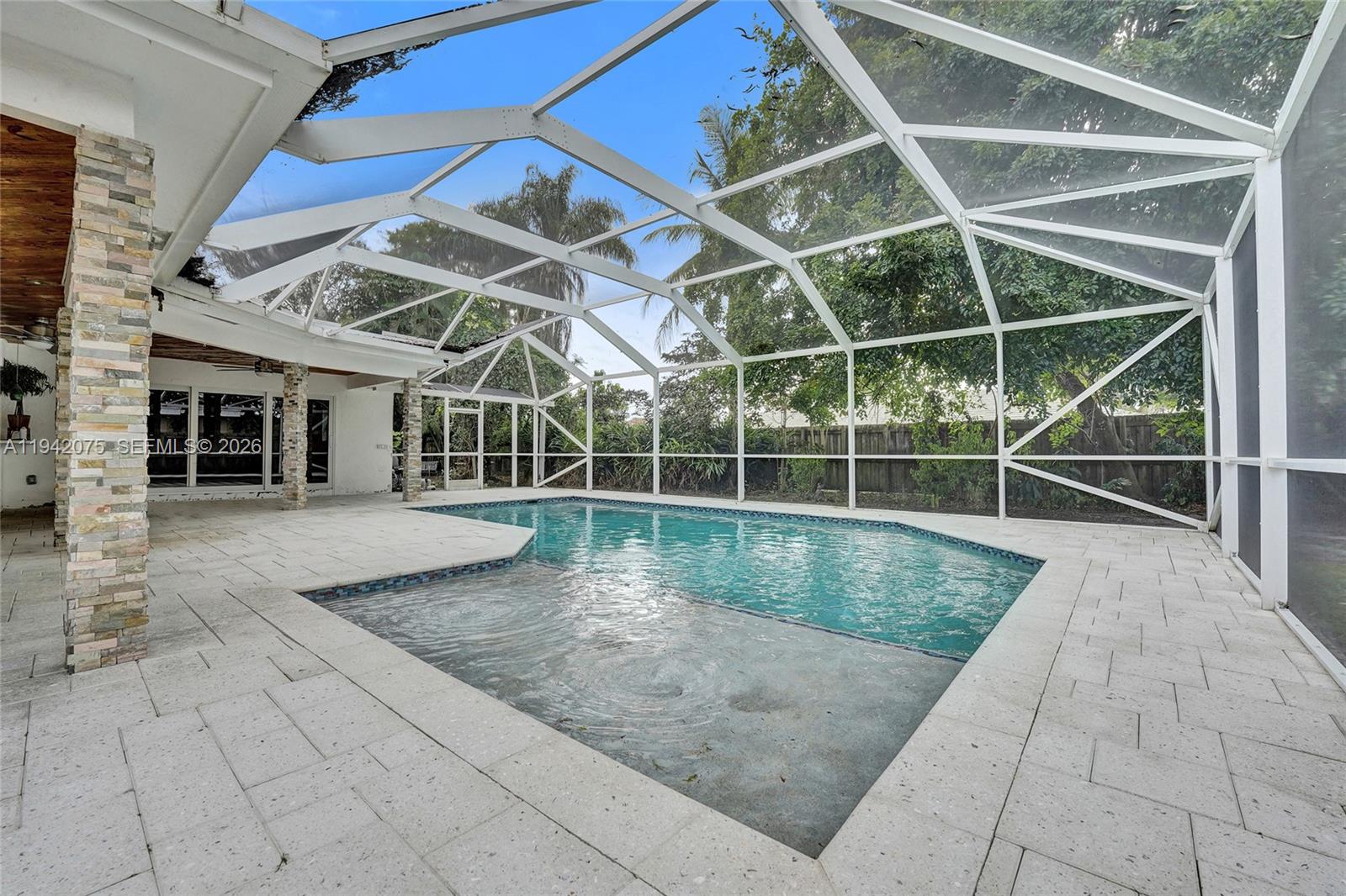 7420 Southwest 13th Street Plantation, FL 33317 - Photo 60 of 68 a view of a backyard with a patio
