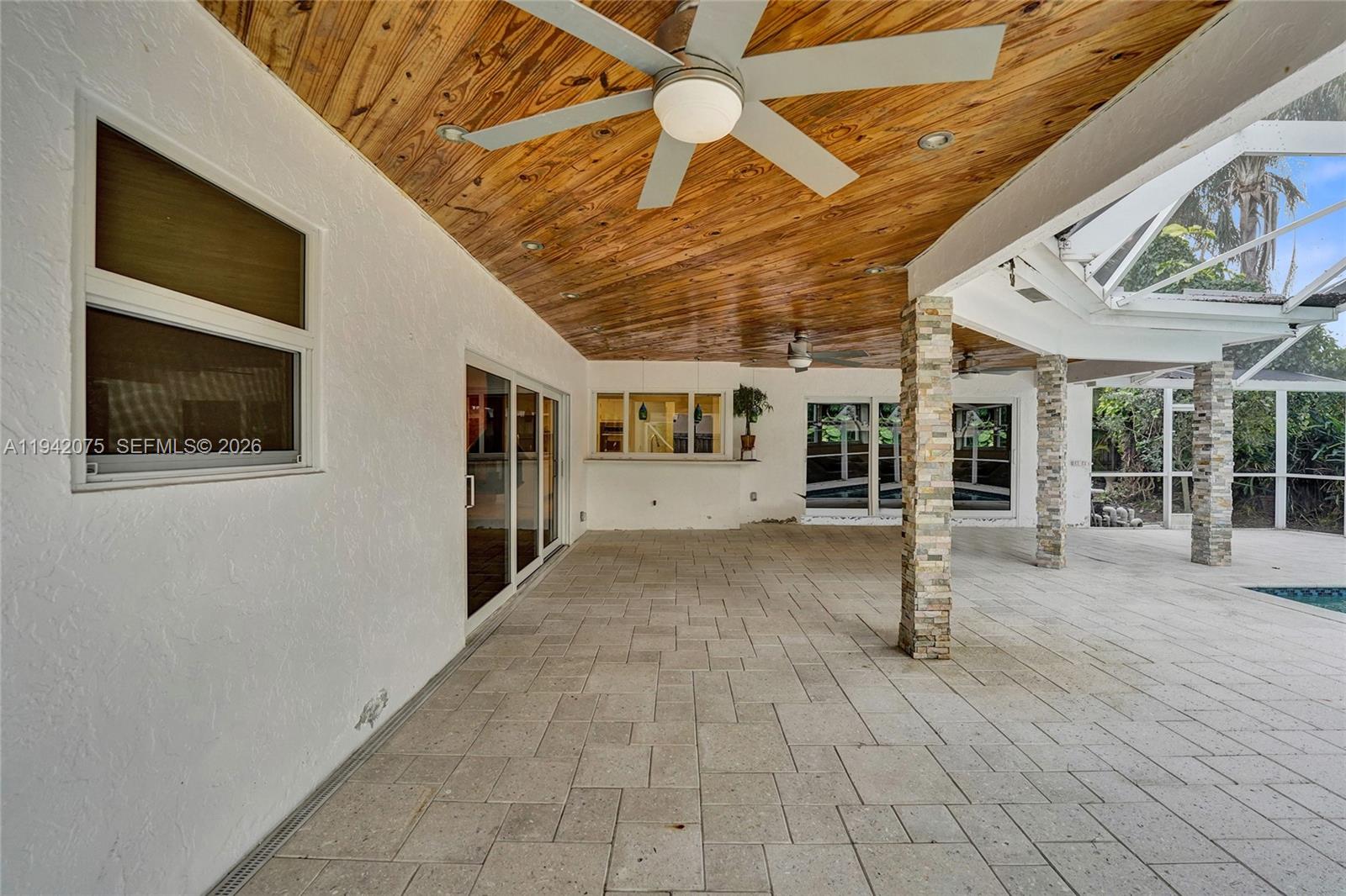 7420 Southwest 13th Street Plantation, FL 33317 - Photo 6 of 68 a front view of a house with a yard