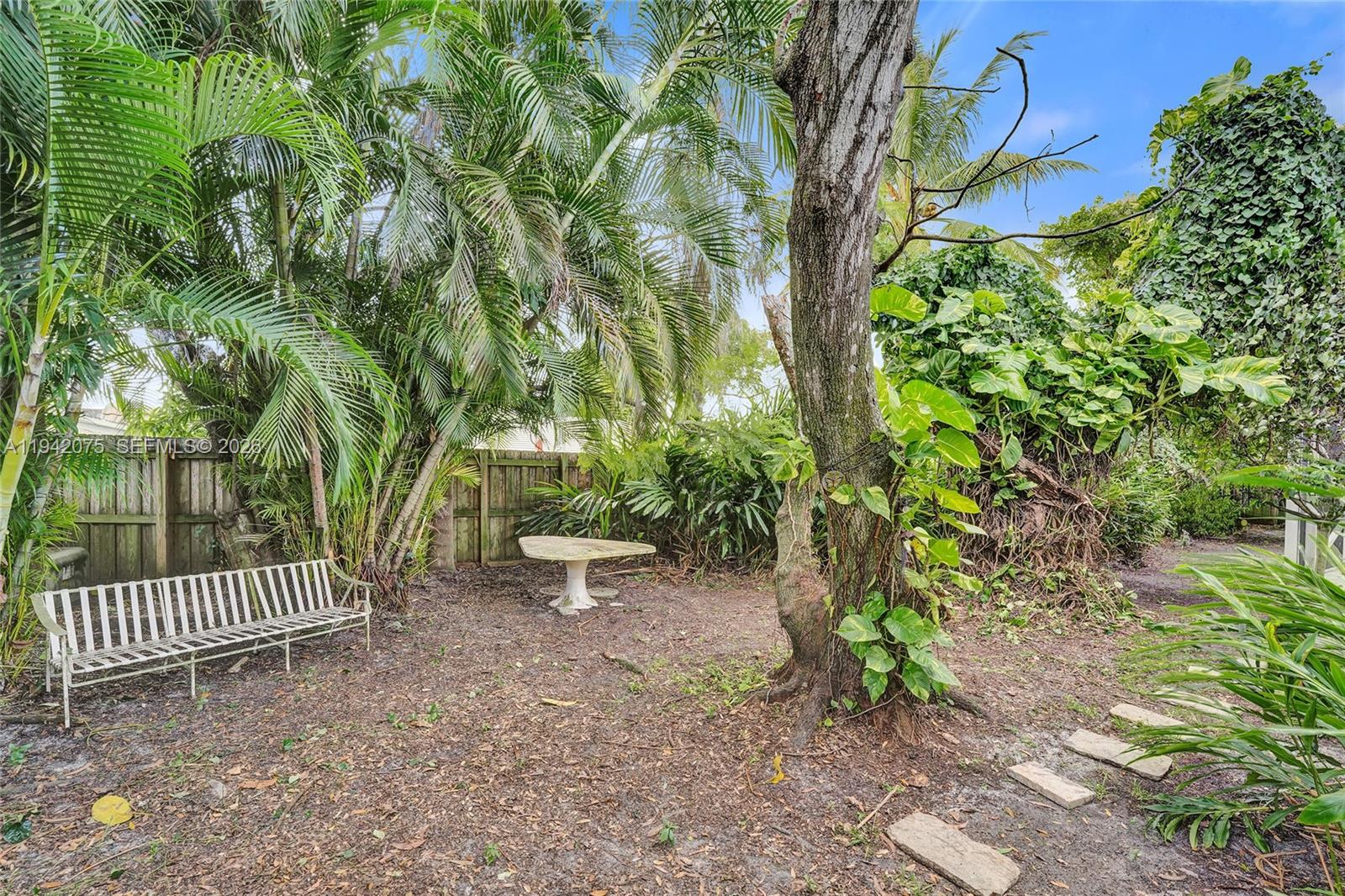 7420 Southwest 13th Street Plantation, FL 33317 - Photo 68 of 68 a view of a bench in backyard