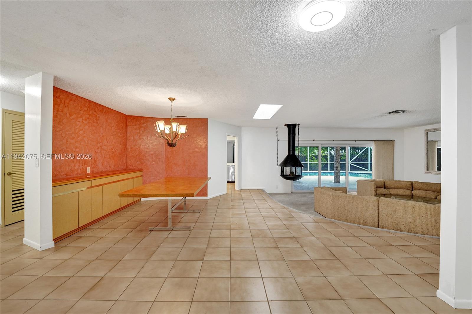 7420 Southwest 13th Street Plantation, FL 33317 - Photo 7 of 68 a very nice looking room with a large window and furniture