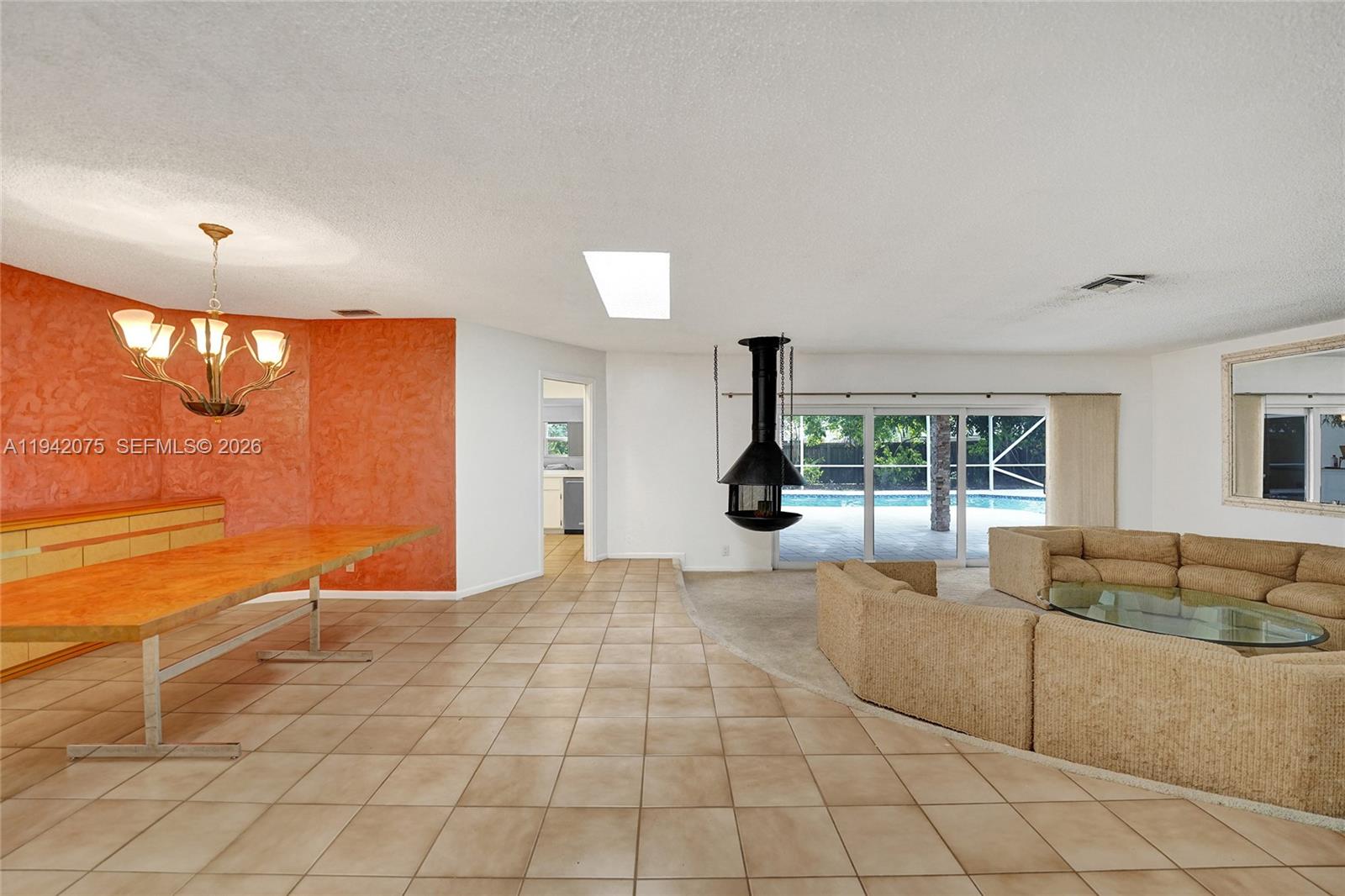 7420 Southwest 13th Street Plantation, FL 33317 - Photo 8 of 68 a view of a livingroom with furniture and window