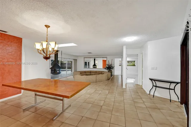 a view of a livingroom with furniture and window