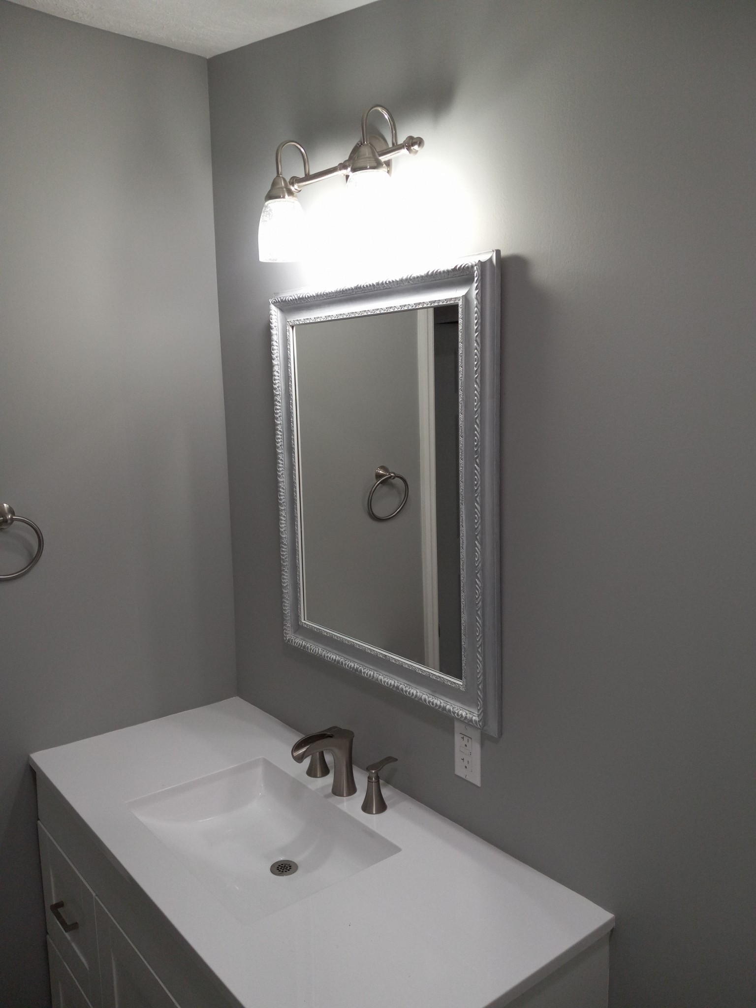 1800 Poplar Union Road Duck River, TN 38454 - Photo 15 of 17 a bathroom with a sink vanity and a mirror