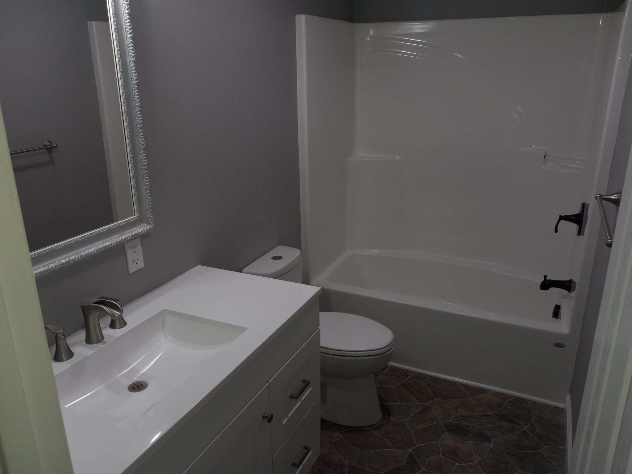 1800 Poplar Union Road Duck River, TN 38454 - Photo 16 of 17 a bathroom with a sink toilet and shower