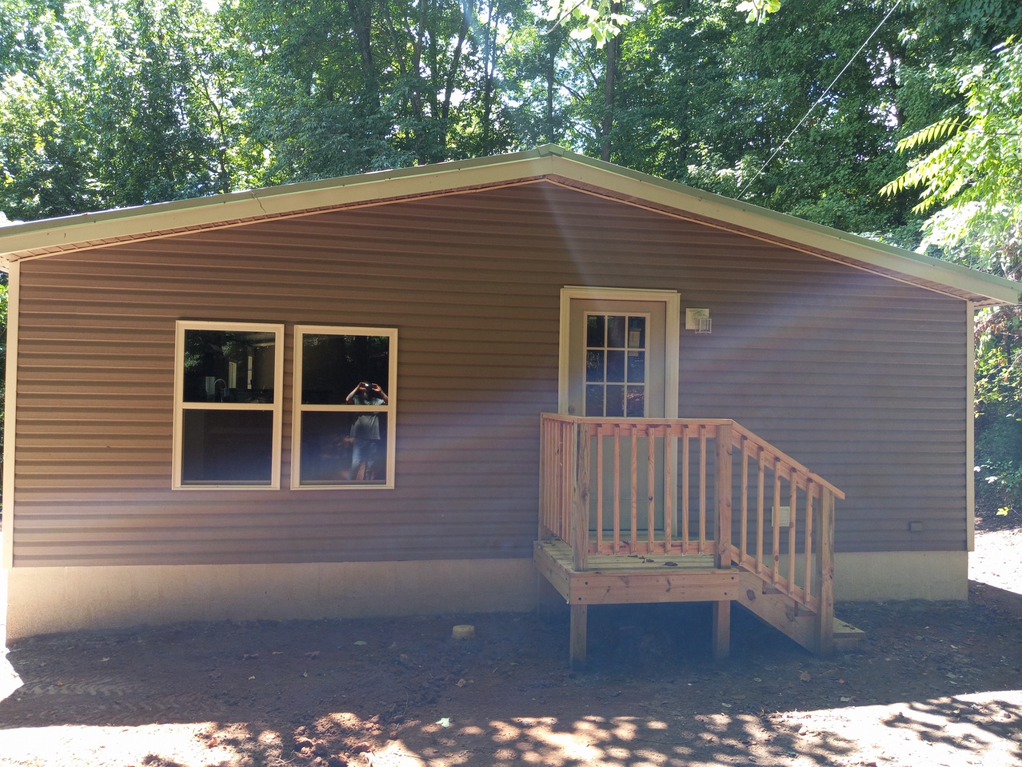 1800 Poplar Union Road Duck River, TN 38454 - Photo 3 of 17 a view of backyard with deck and outdoor seating