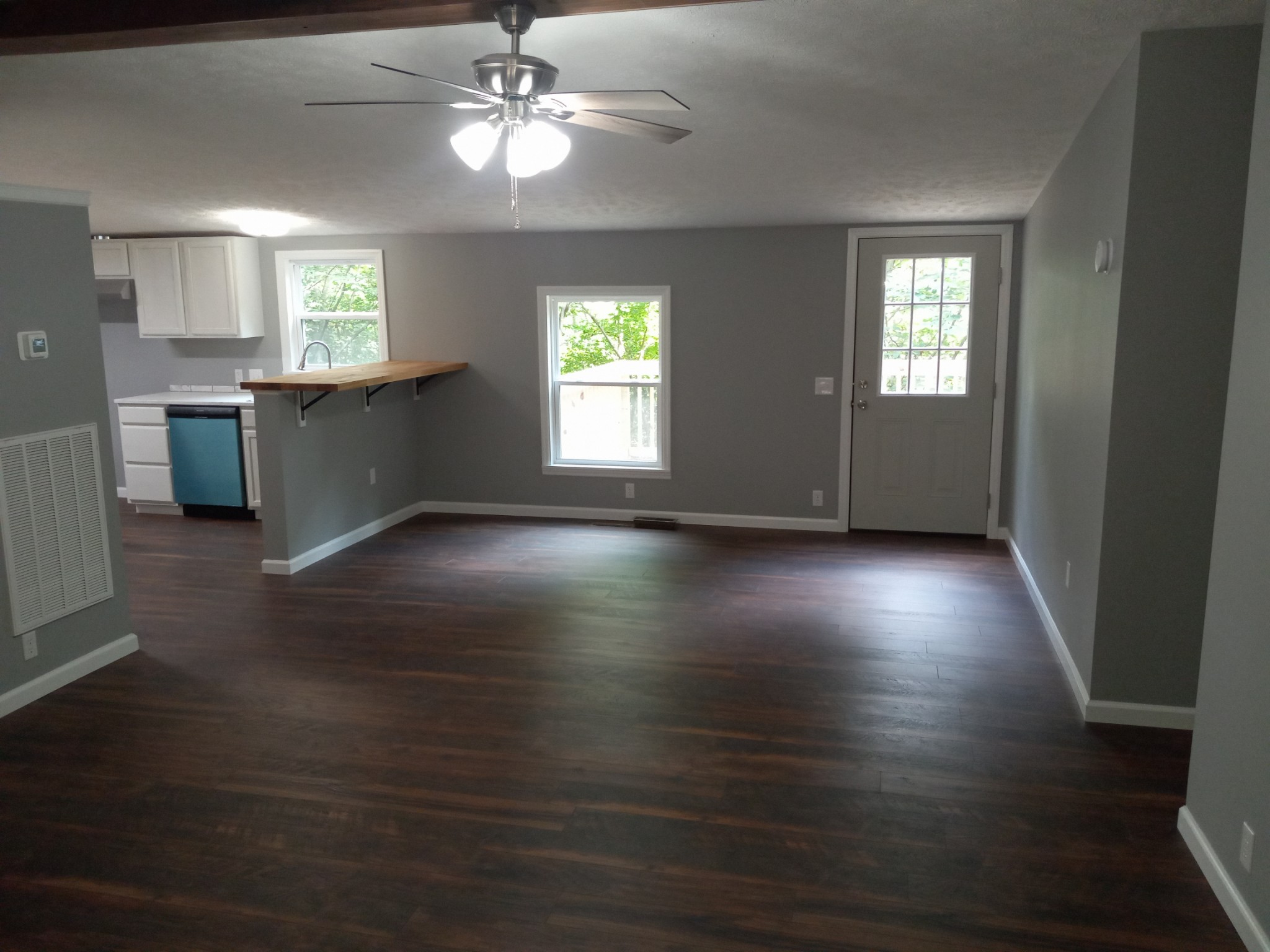 1800 Poplar Union Road Duck River, TN 38454 - Photo 5 of 17 wooden floor in an empty room with a window