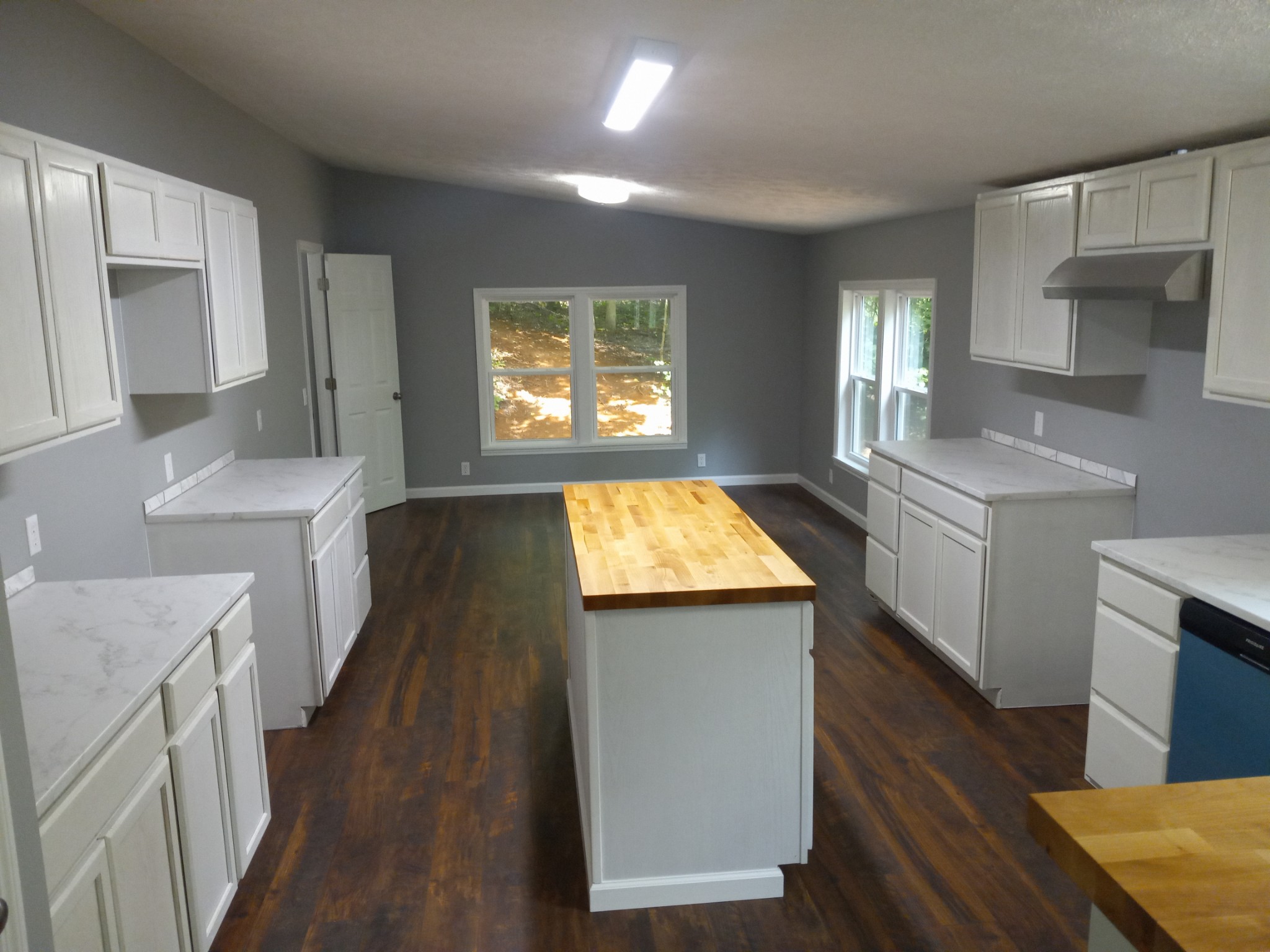 1800 Poplar Union Road Duck River, TN 38454 - Photo 6 of 17 a kitchen with a sink stove and refrigerator