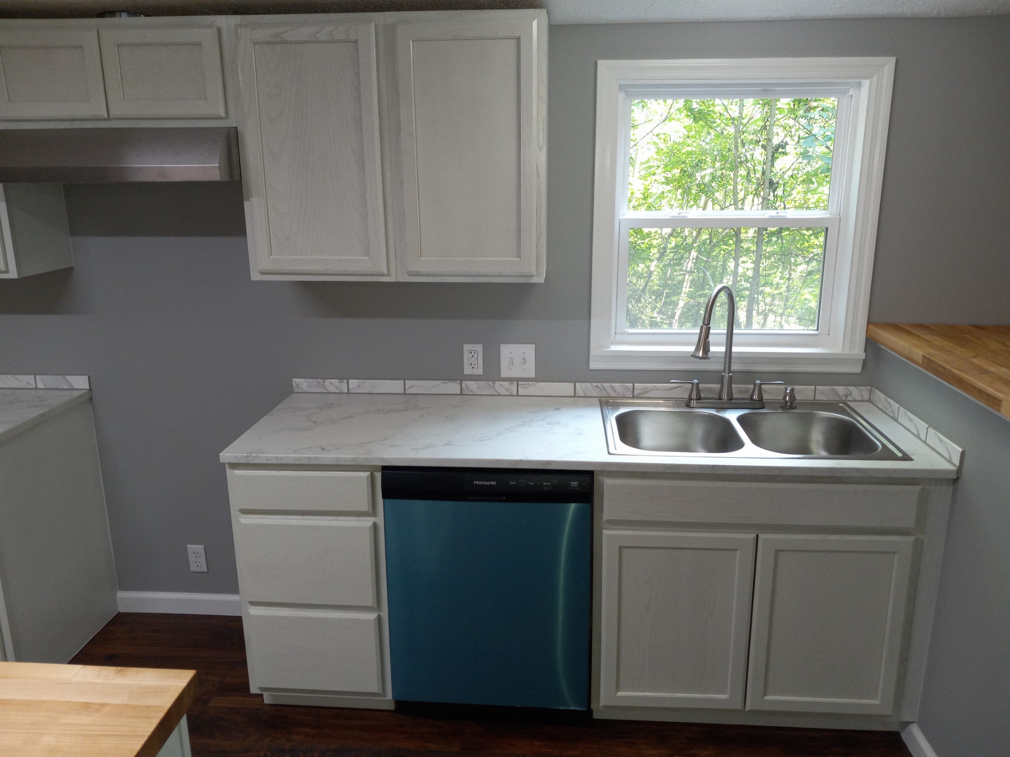1800 Poplar Union Road Duck River, TN 38454 - Photo 8 of 17 a kitchen with sink cabinets and window