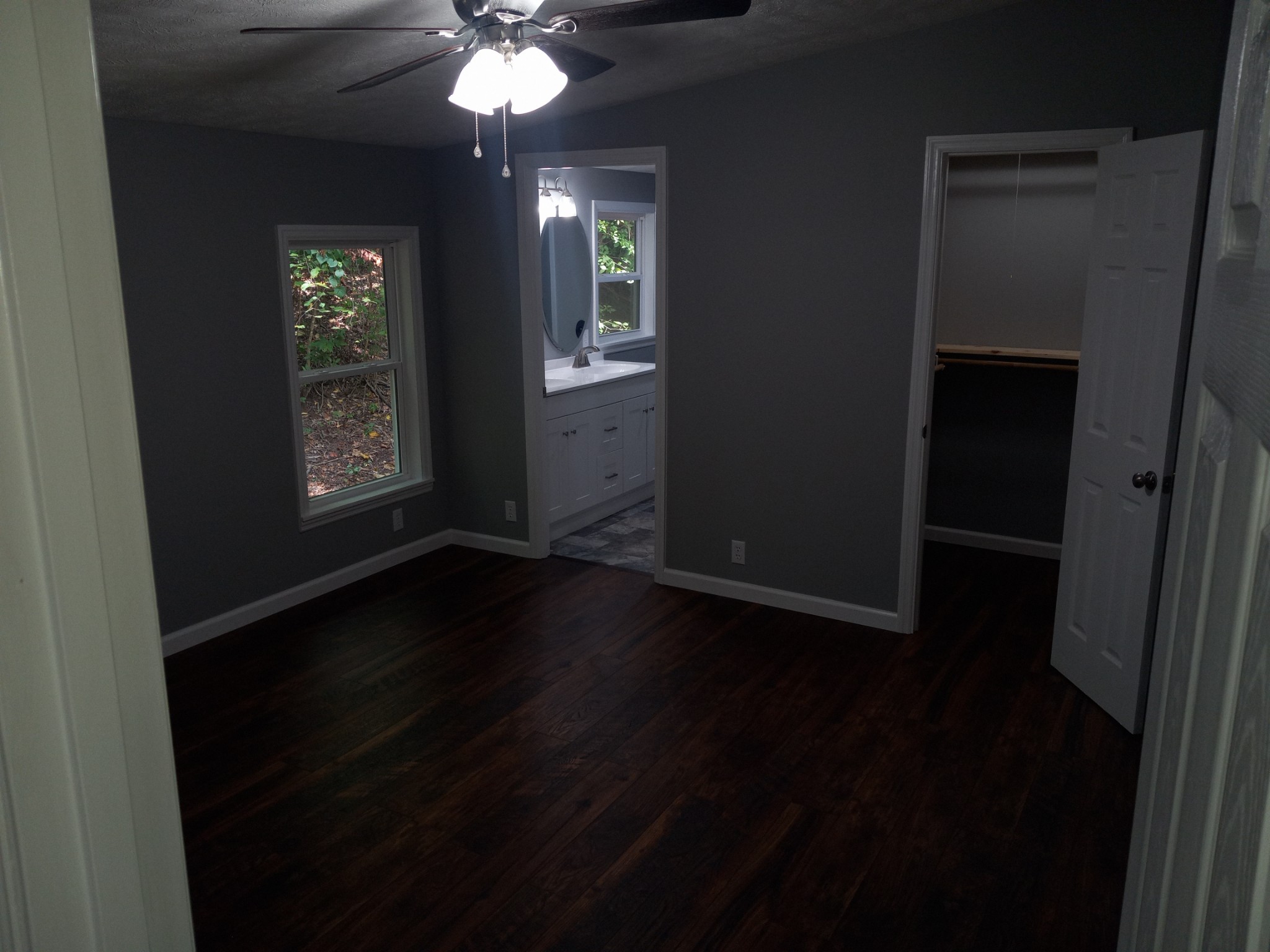 1800 Poplar Union Road Duck River, TN 38454 - Photo 9 of 17 a view of an empty room with wooden floor and a window