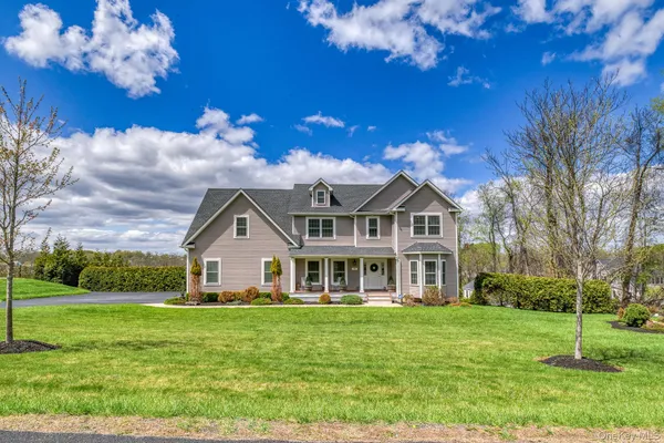 a view of a house with a big yard