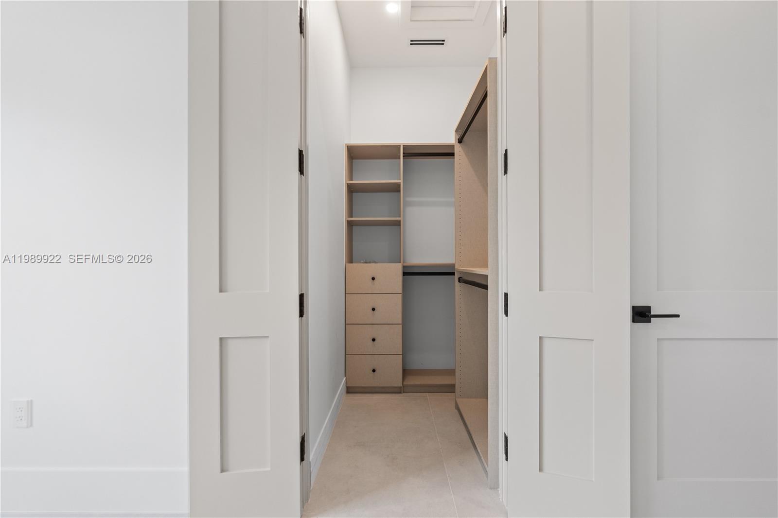6221 Southwest 60th Street South Miami, FL 33143 - Photo 32 of 42 a view of walk in closet