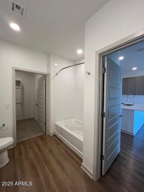 1225 North Arizona Avenue, Unit A1 1 Gilbert, AZ 85233 - Photo 8 of 20 a bathroom with a tub and shower