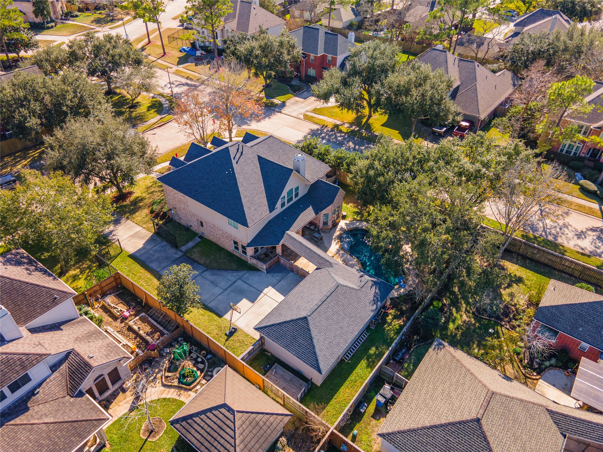 700 Red Oak Lane Friendswood, TX 77546 - Photo 2 of 48 an aerial view of a house with a yard
