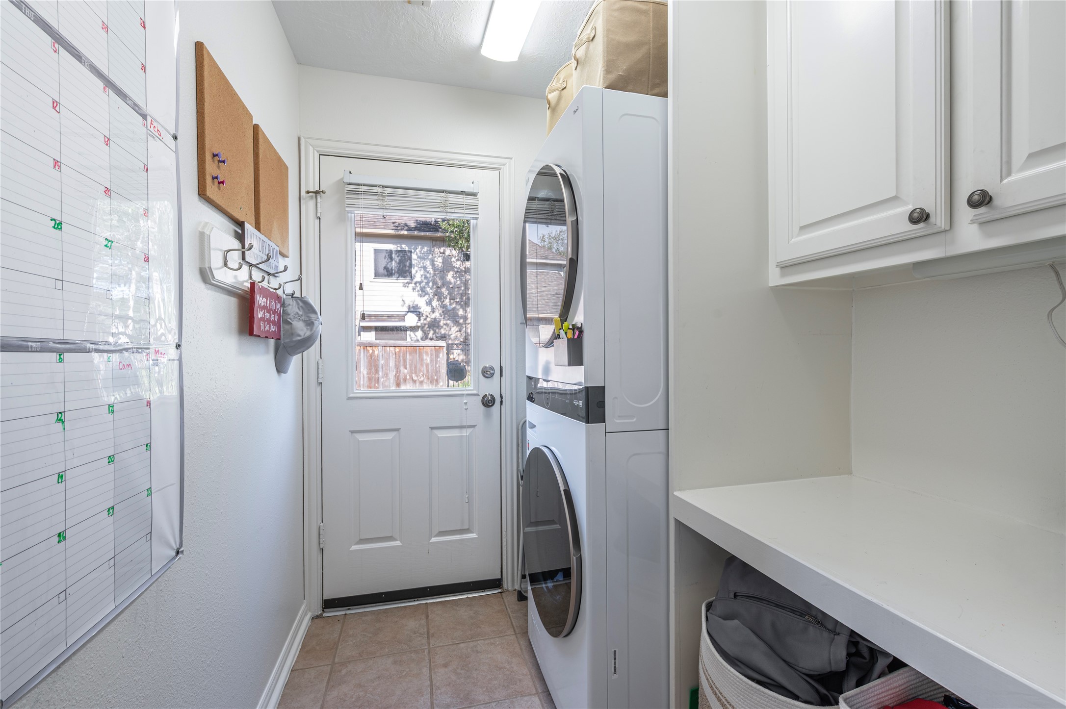 700 Red Oak Lane Friendswood, TX 77546 - Photo 21 of 48 a view of workspace with wooden floor and cabinets