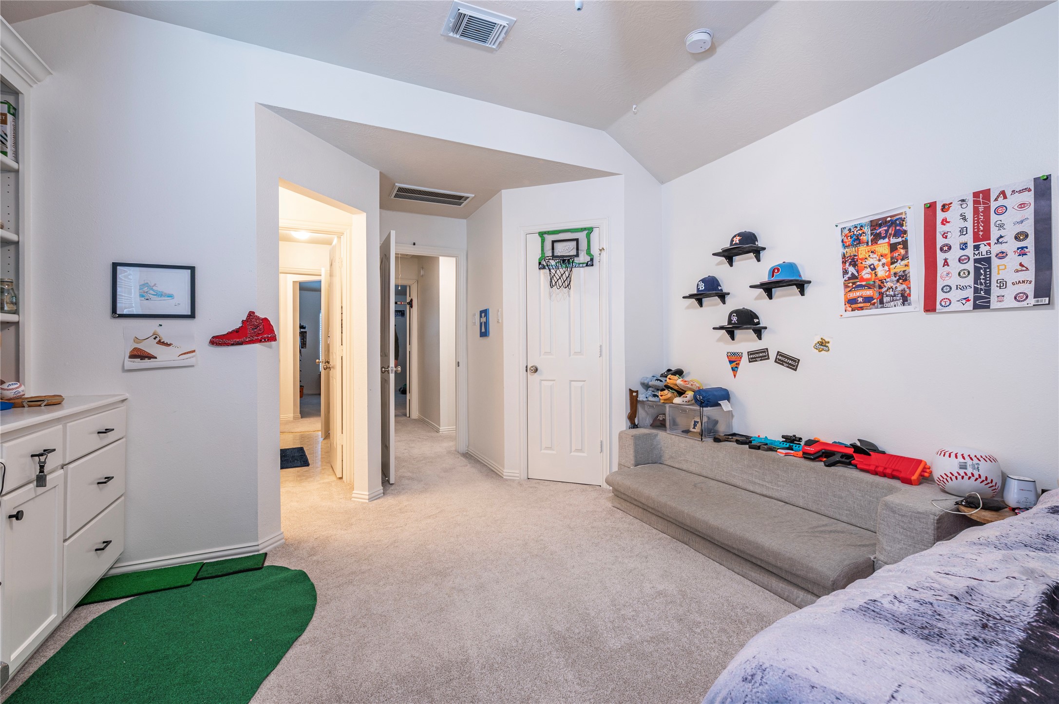 700 Red Oak Lane Friendswood, TX 77546 - Photo 30 of 48 a bed room with a bed and a dresser