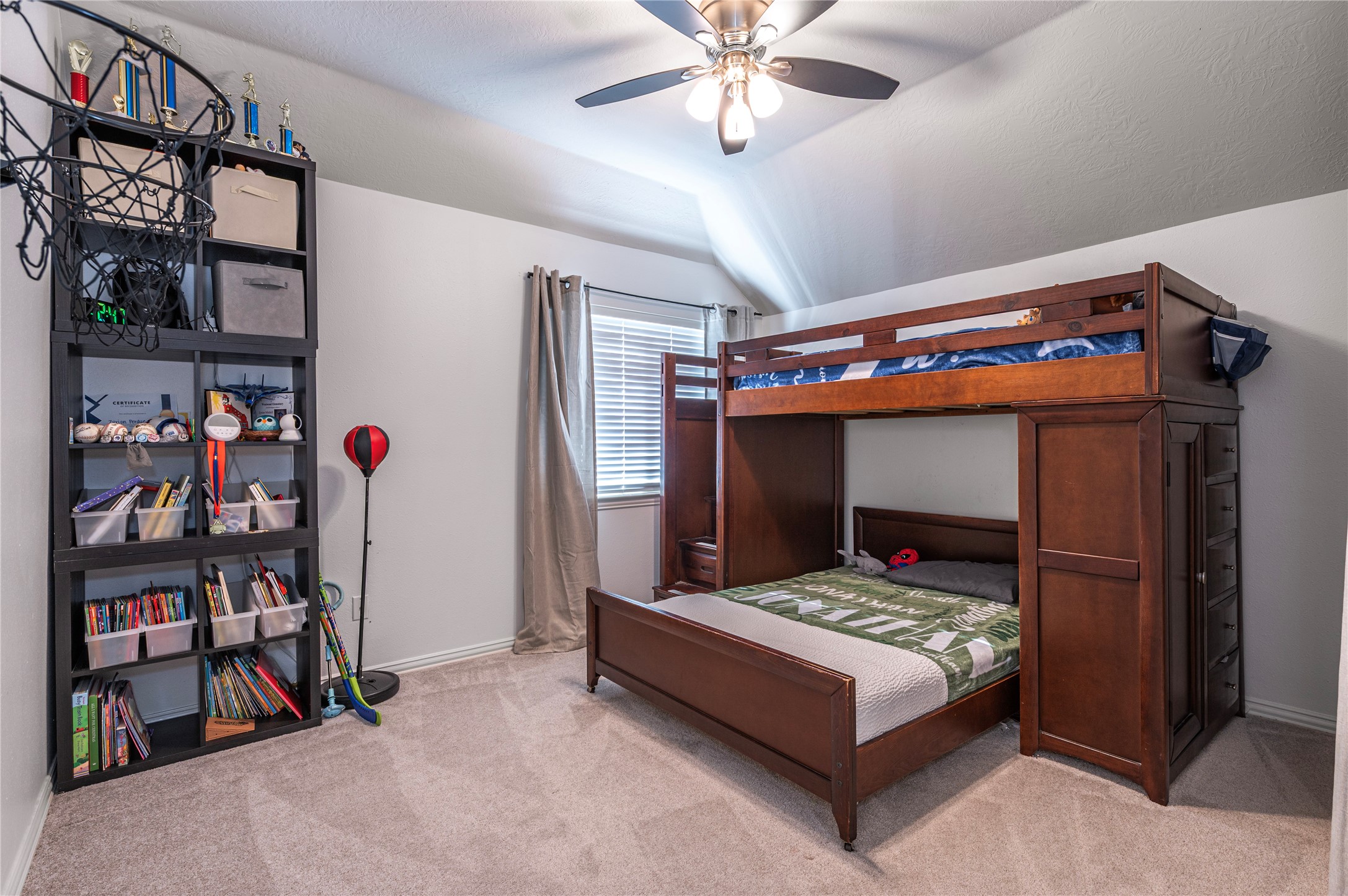 700 Red Oak Lane Friendswood, TX 77546 - Photo 35 of 48 a bedroom with a bed and a closet
