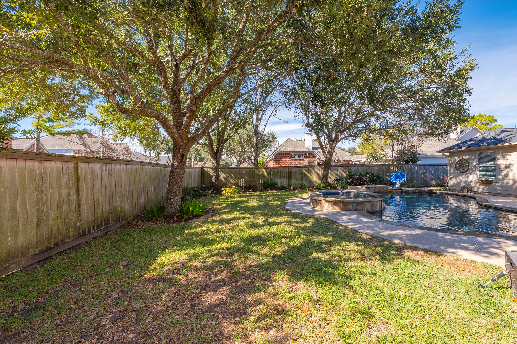 700 Red Oak Lane Friendswood, TX 77546 - Photo 43 of 48 a view of swimming pool with sitting area