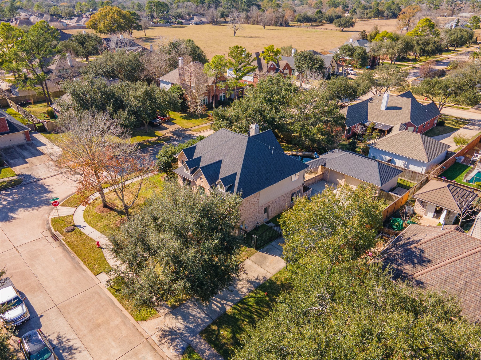 700 Red Oak Lane Friendswood, TX 77546 - Photo 47 of 48 an aerial view of house with yard and ocean view