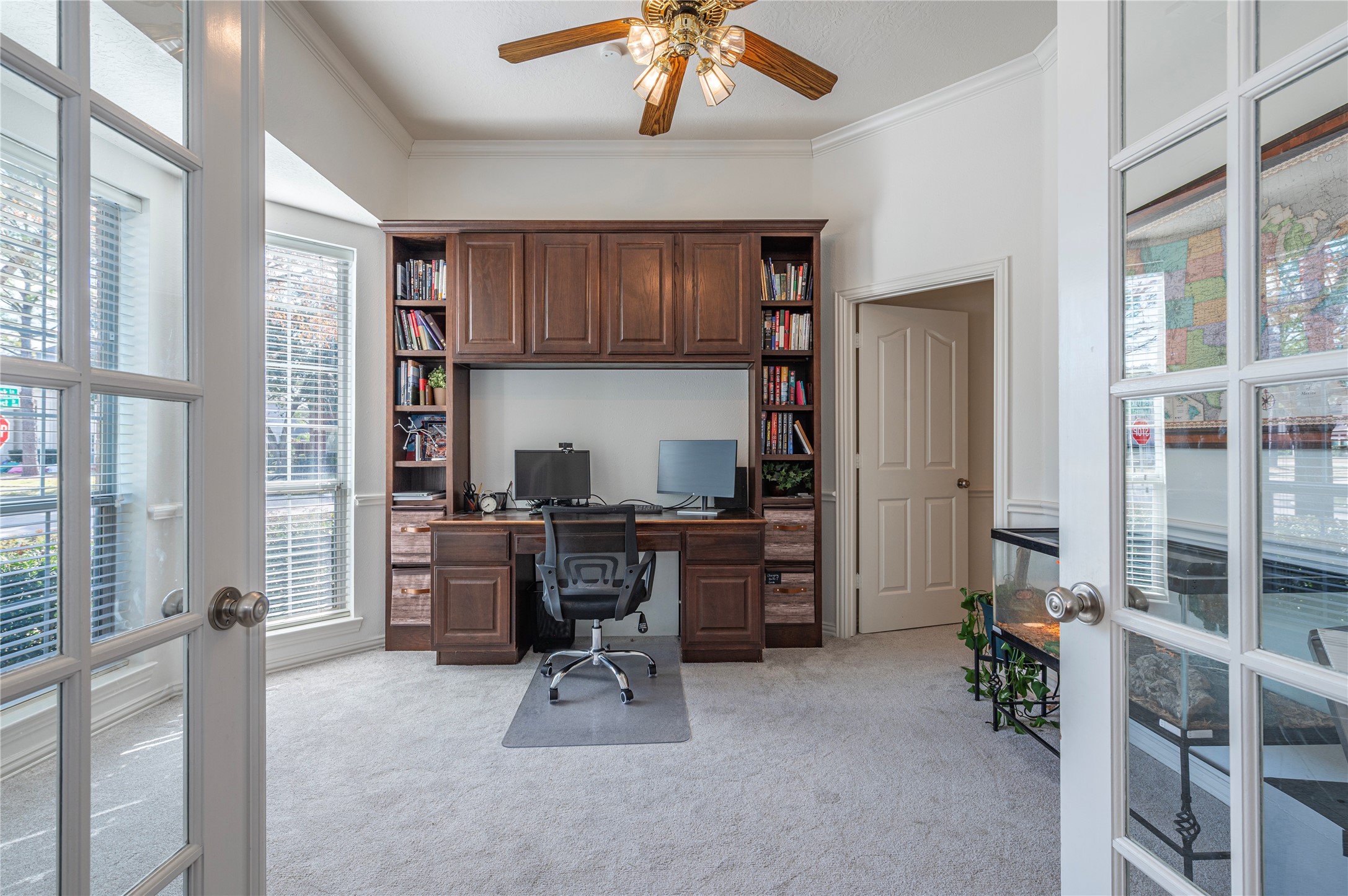 700 Red Oak Lane Friendswood, TX 77546 - Photo 9 of 48 a kitchen with stainless steel appliances kitchen island granite countertop a refrigerator and a sink
