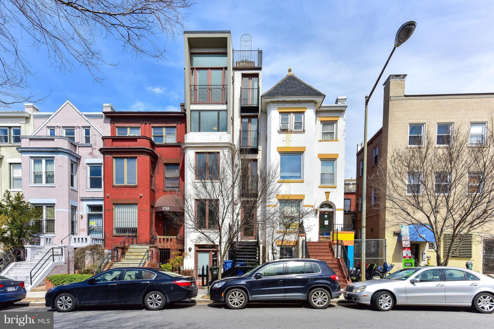 2713 Ontario Road Northwest, Unit 4 Washington, DC 20009 - Photo 24 of 25 a car parked in front of a building