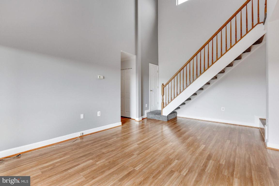 15601 Dorset Road, Unit 11 Laurel, MD 20707 - Photo 11 of 31 Living room w/ Vaulted Ceilings