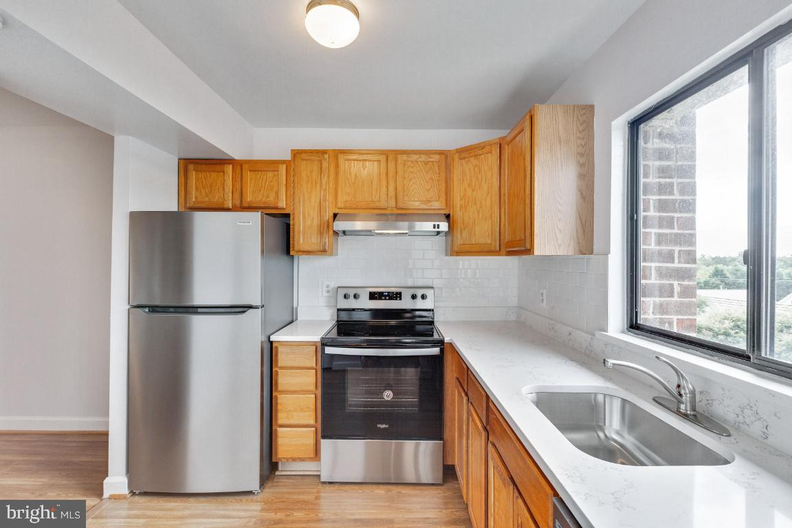 15601 Dorset Road, Unit 11 Laurel, MD 20707 - Photo 6 of 31 Updated kitchen w/Marble Tops & SS Appliances