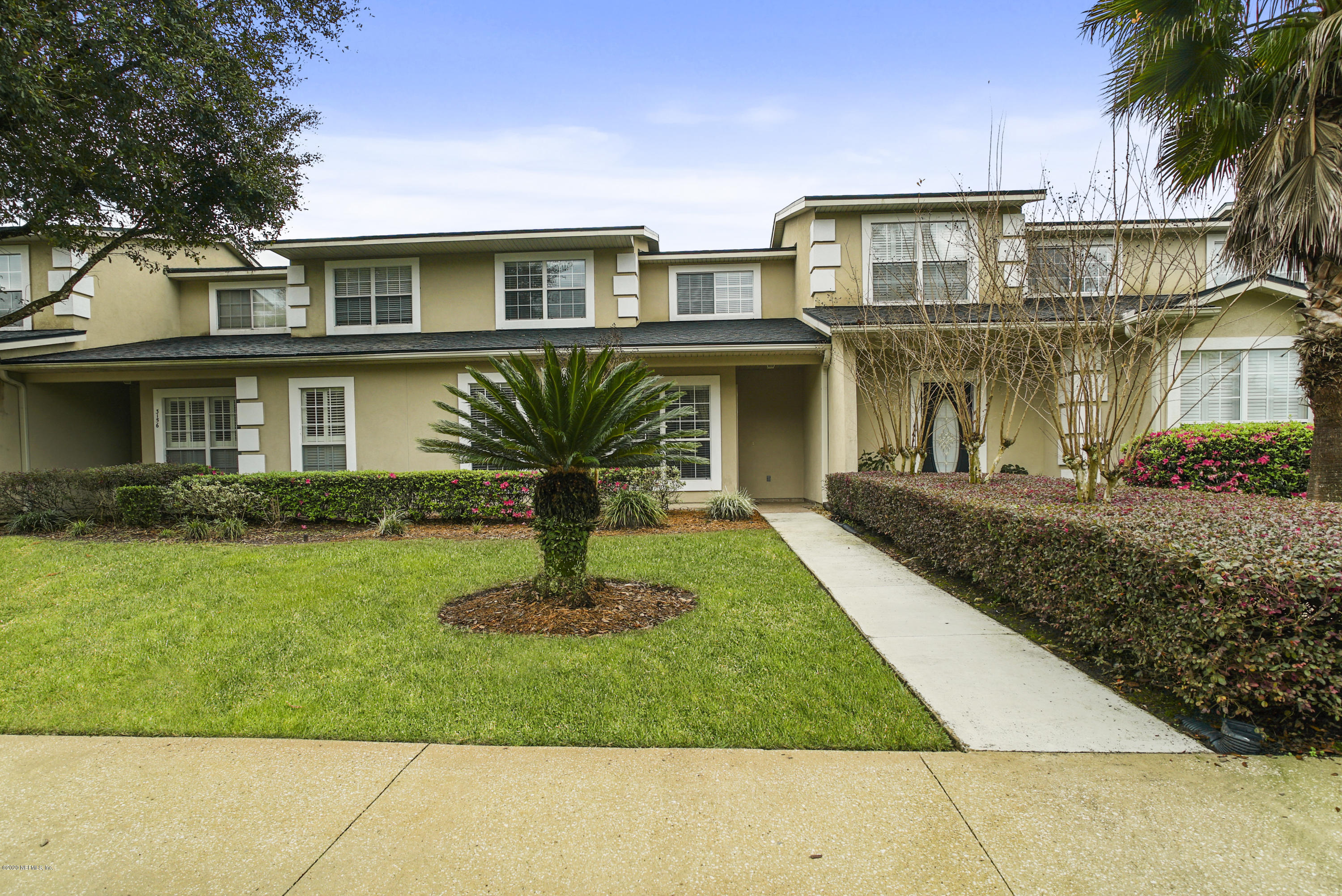 3158 Ravines Road Middleburg, FL 32068 - Photo 1 of 34 a front view of a house with a yard