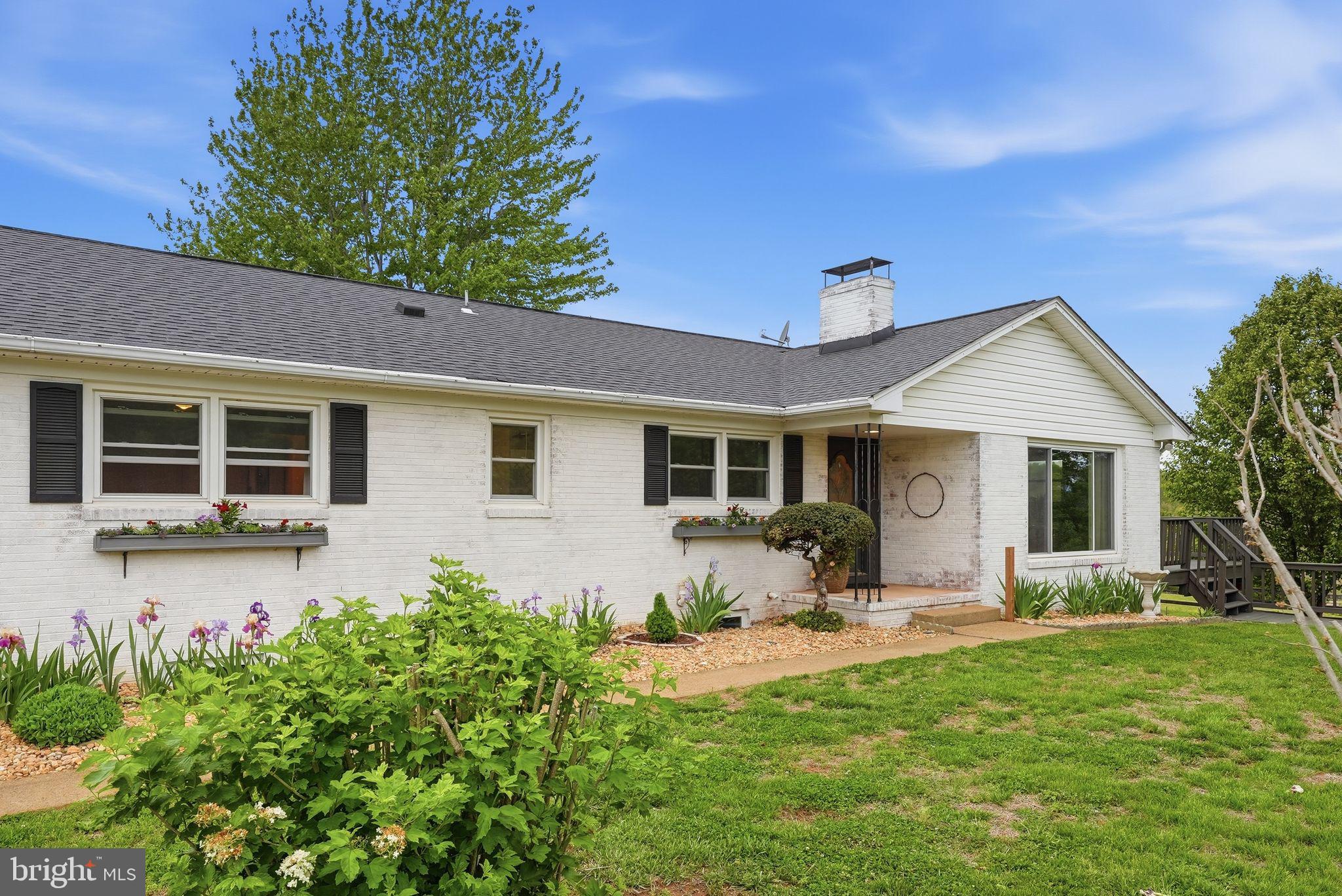 481 James City Road Leon, VA 22725 - Photo 62 of 89 a front view of house with yard and outdoor seating