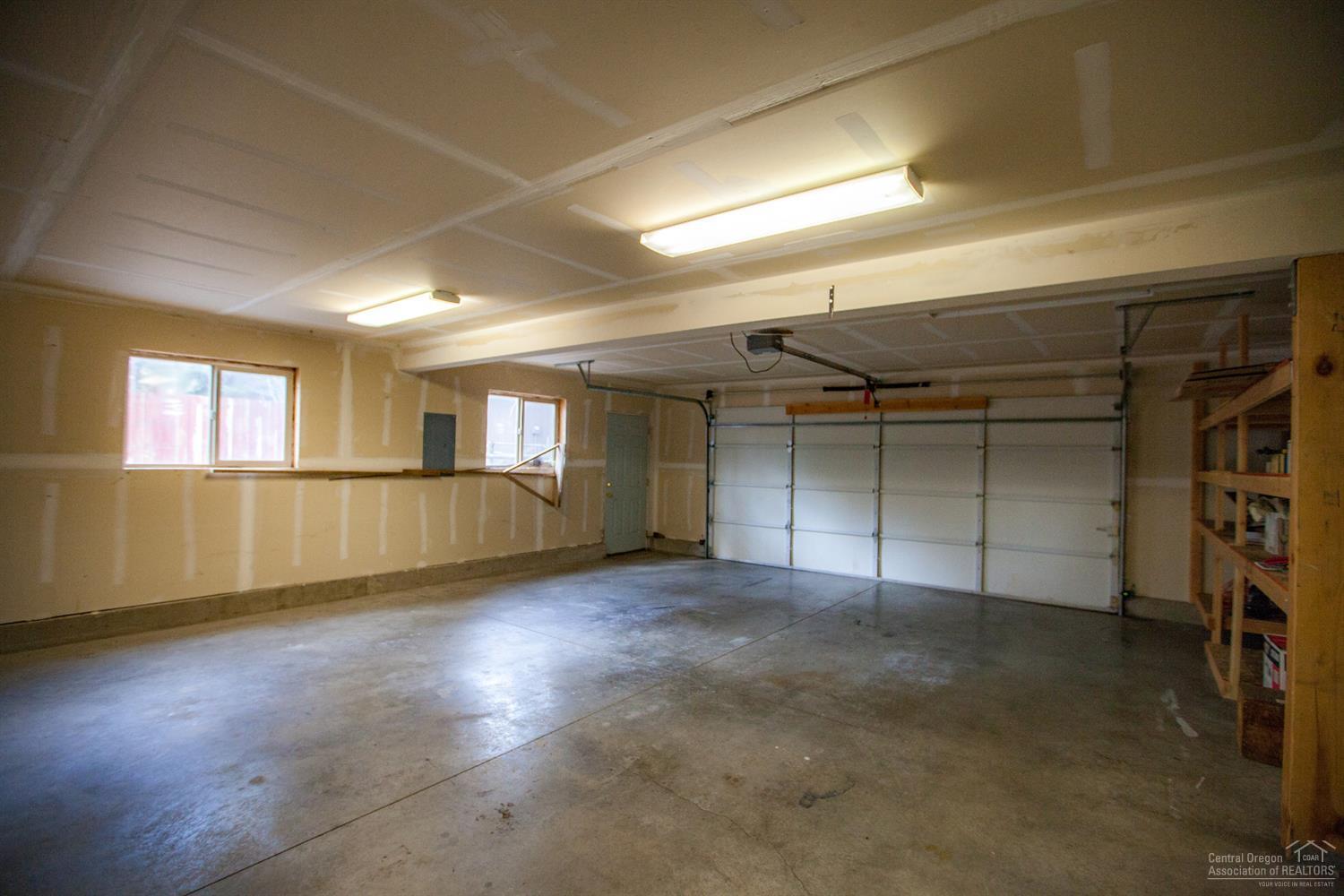 60232 East Ridgeview Drive Bend, OR 97702 - Photo 18 of 23 an empty room with windows