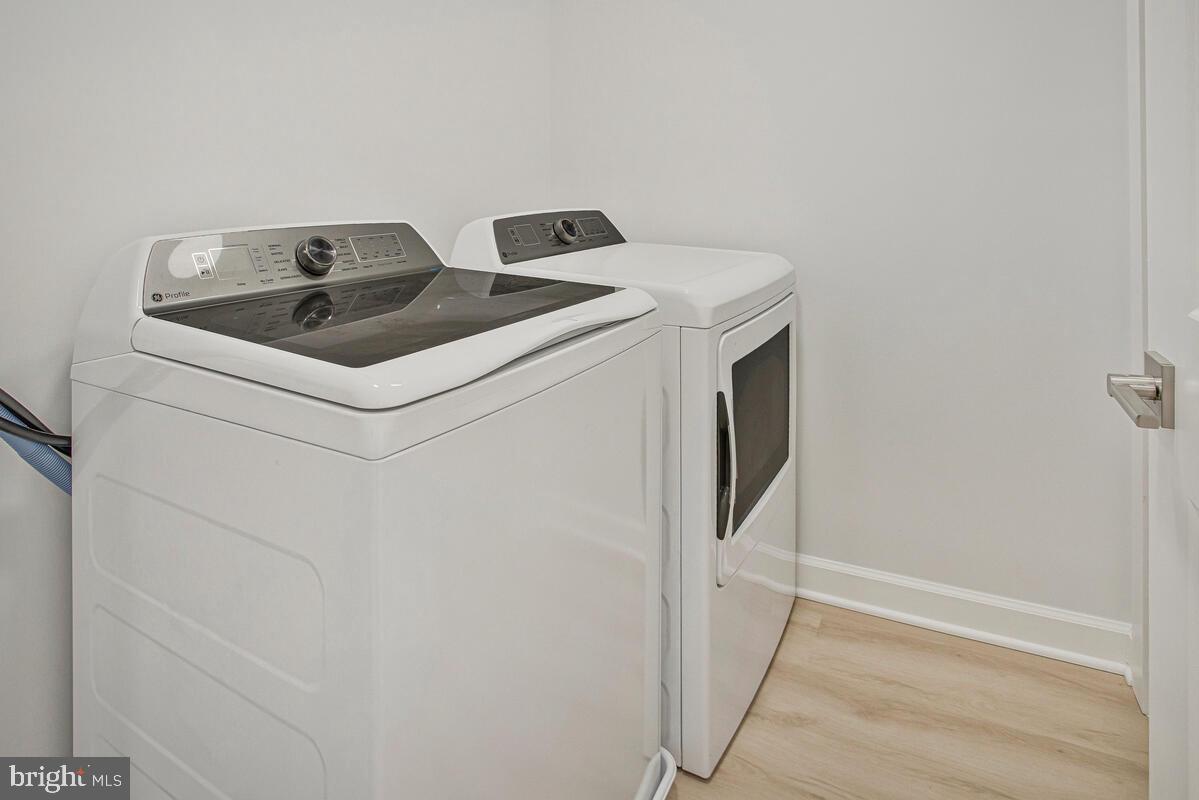 2258 Brookfield Avenue Baltimore, MD 21217 - Photo 22 of 42 a utility room with dryer and washer