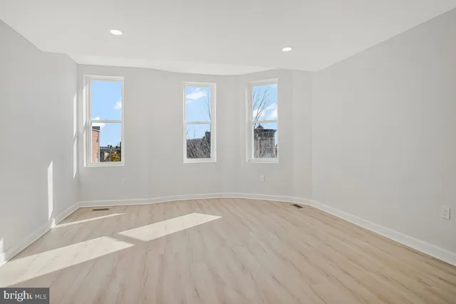 an empty room with windows