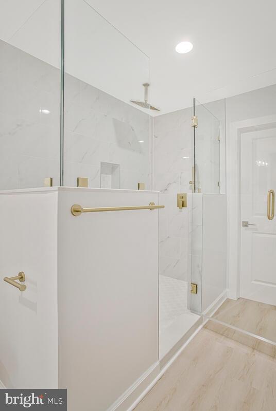 2258 Brookfield Avenue Baltimore, MD 21217 - Photo 30 of 42 a bathroom with a shower and a sink