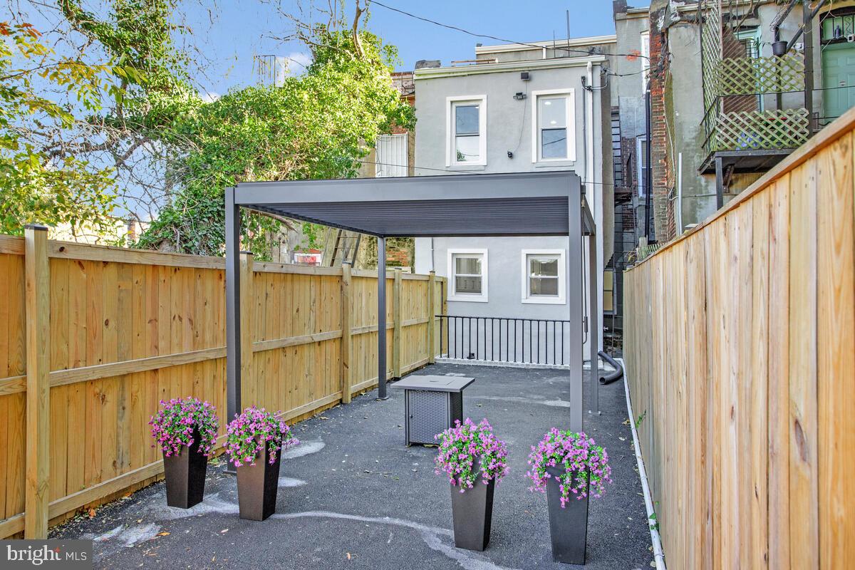 2258 Brookfield Avenue Baltimore, MD 21217 - Photo 36 of 42 a view of a house with a potted plant