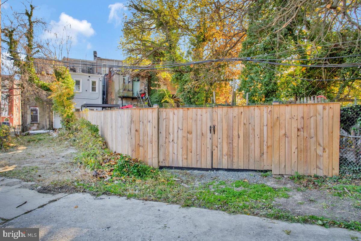2258 Brookfield Avenue Baltimore, MD 21217 - Photo 38 of 42 a view of a backyard with large trees