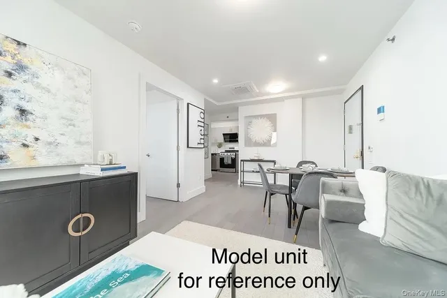 a living room with furniture and a table