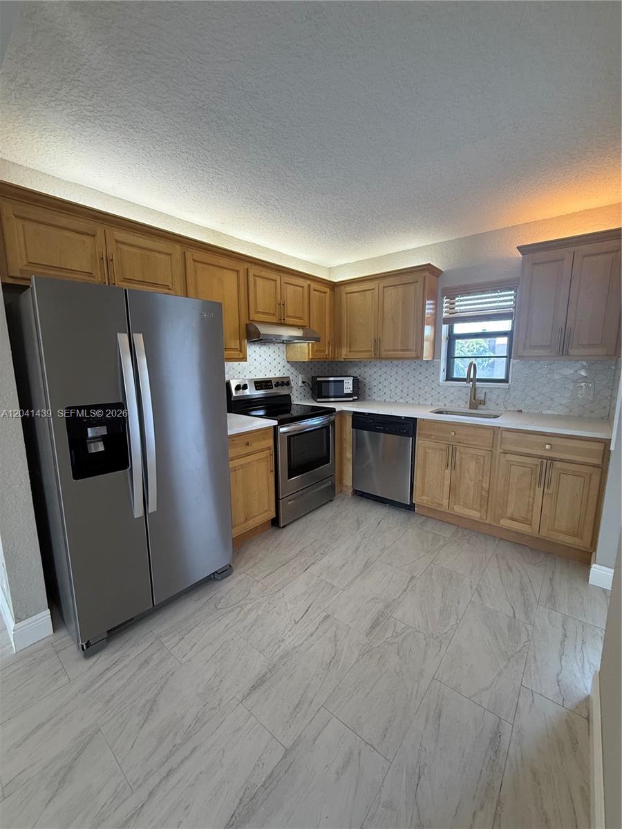 9273 Southwest 8th Street, Unit 311 Boca Raton, FL 33428 - Photo 2 of 17
