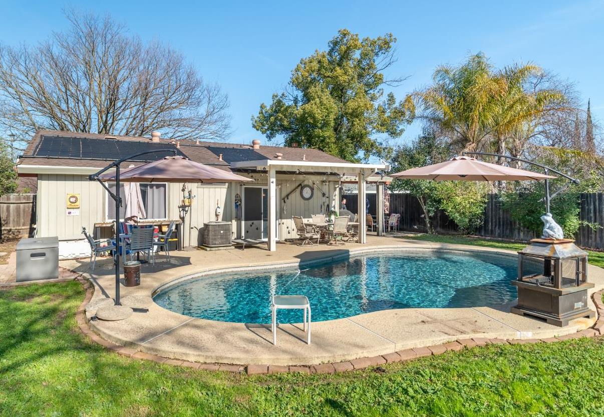 4920 Springfield Way Sacramento, CA 95841 - Photo 24 of 24 Nice size backyard with sparkling solar heated pool