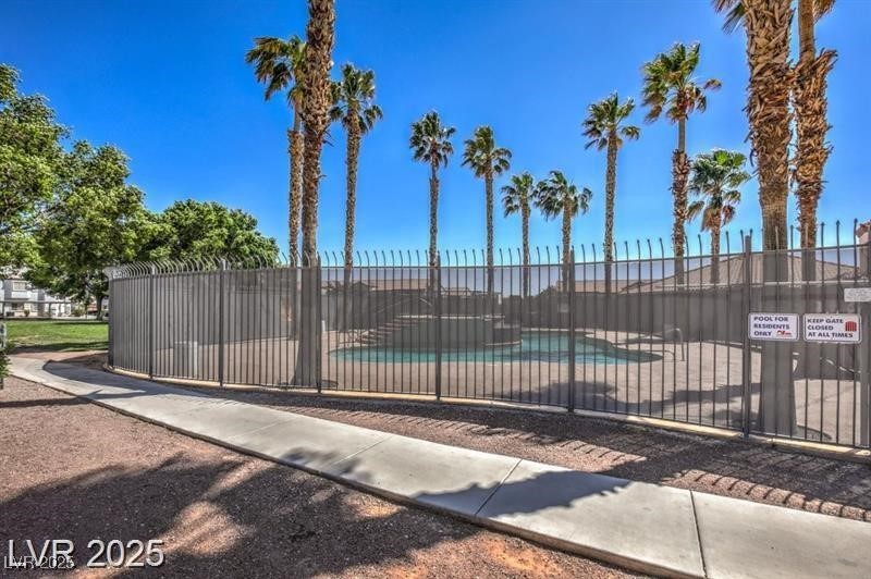 3318 North Decatur Boulevard, Unit 2138 Las Vegas, NV 89130 - Photo 39 of 40 Gate featuring a community pool