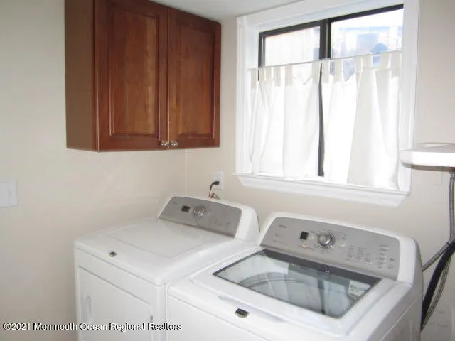 a view of lake with green space