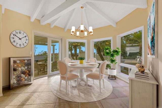 a kitchen with stainless steel appliances granite countertop a stove and a refrigerator
