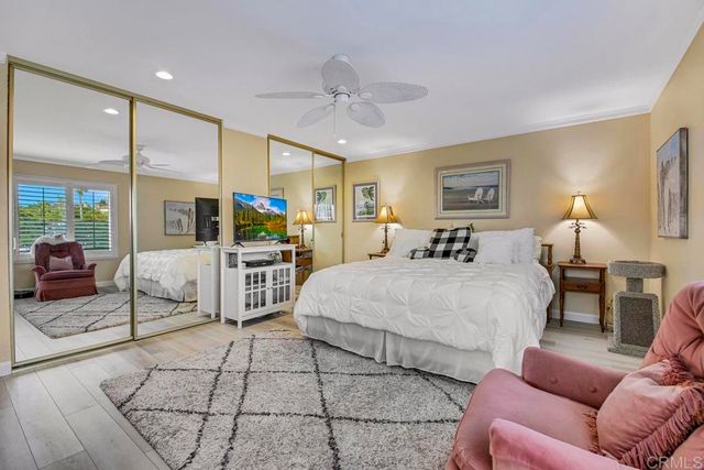 a kitchen with stainless steel appliances a stove a sink dishwasher and a refrigerator