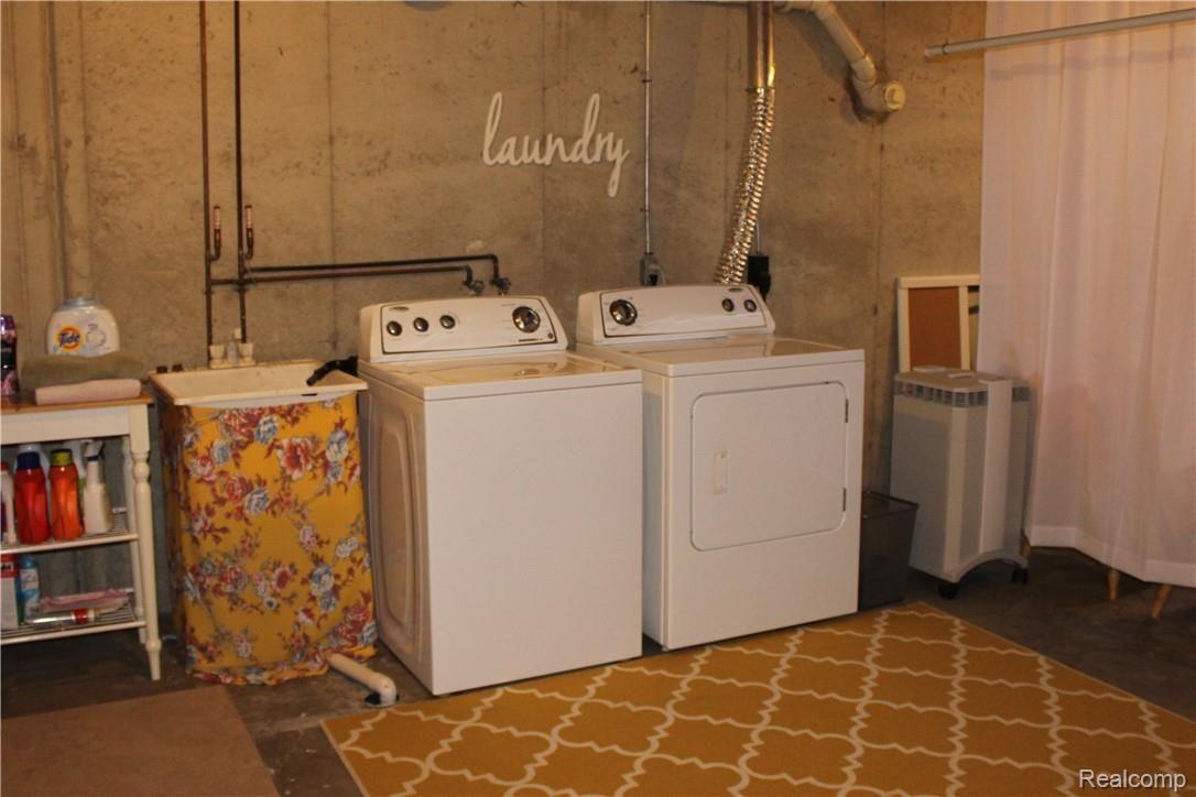 7227 West Lovejoy Road Byron, MI 48418 - Photo 13 of 17 7227 Lovejoy laundry.JPG