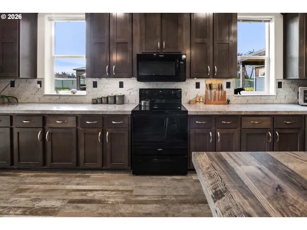a kitchen with a sink and a cabinets