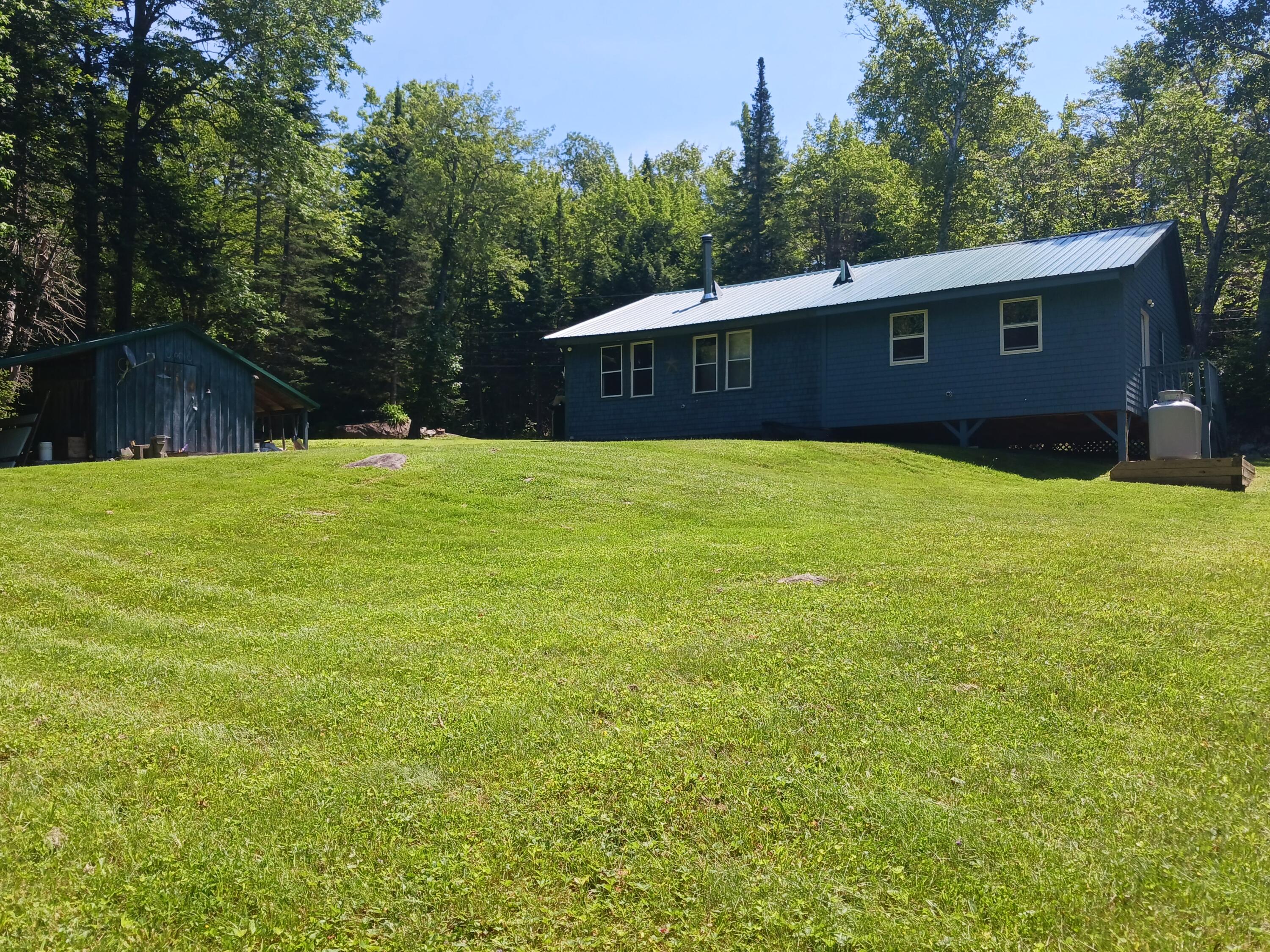 166 Hancock Pond Road New Portland, ME 04961 - Photo 3 of 16 Nice Lawn